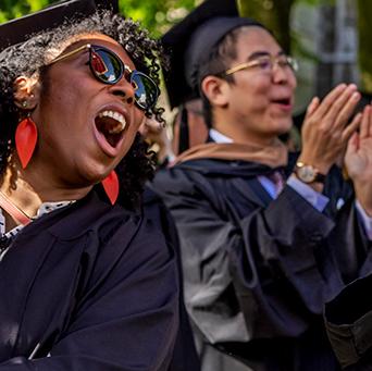 Students cheering at graduation