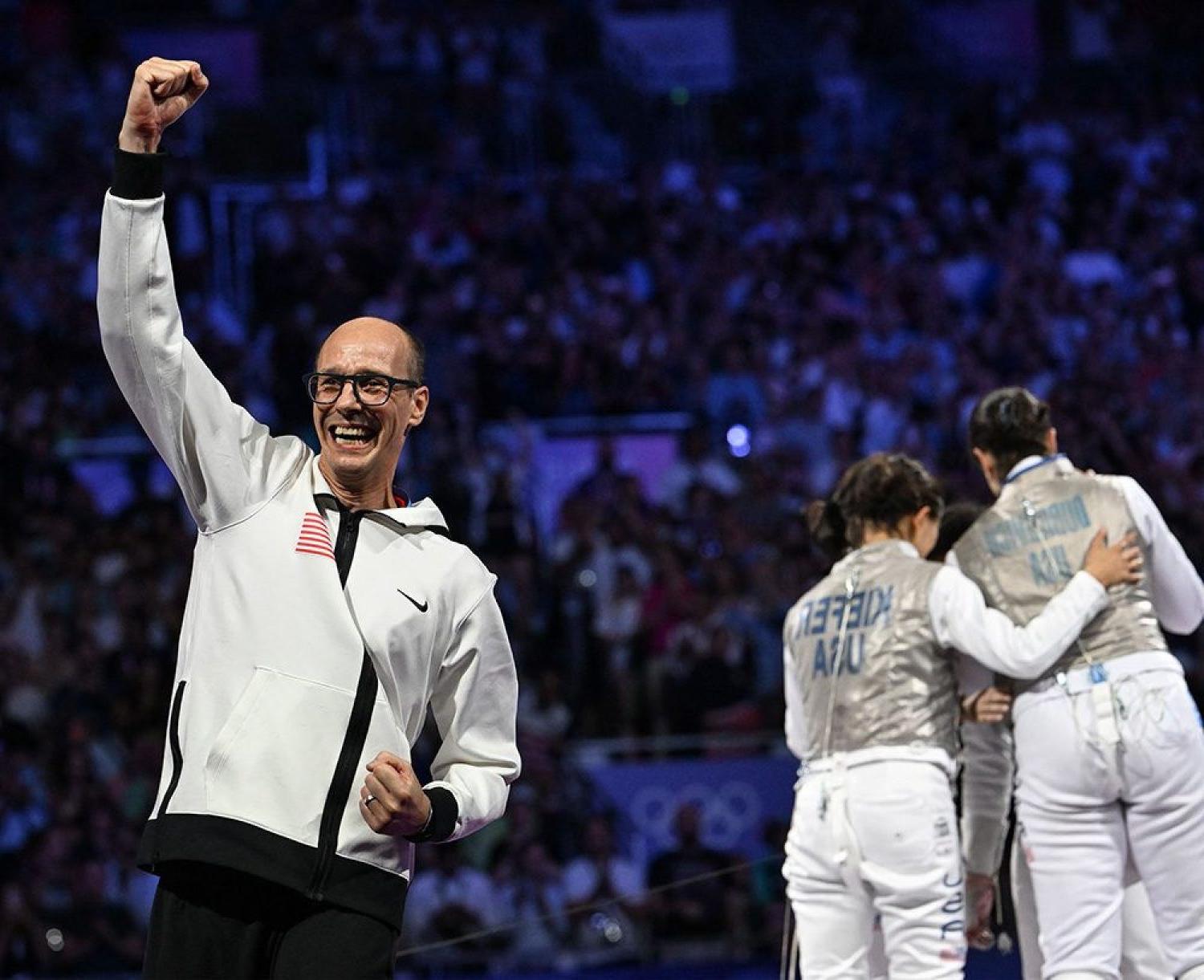 Ralf Bissdorf raises a first in victory at the Olympics.