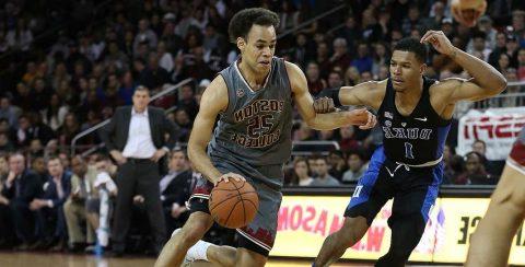 BC men's basketball player Jordan Chatman faces off against Duke