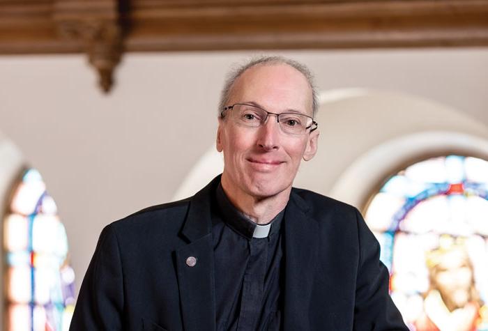 托马斯·D. Stegman, SJ photographed in the balcony of the STM Chapel